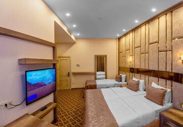 Фото номера Стандартный трехместный номер Отель Nardin Hotel г. Баку 6
