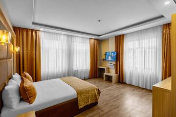 Фото номера Стандартный двухместный номер с 2 отдельными кроватями Отель Nardin Hotel г. Баку 3