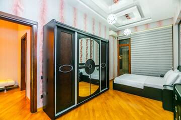 Фото номера Апартаменты с 3 спальнями Апартаменты Luxary Apartment ISR Plaza г. Баку 43