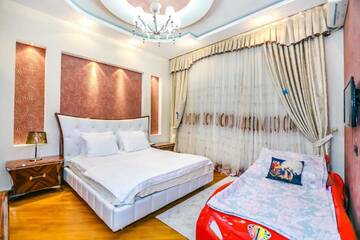 Фото номера Апартаменты с 3 спальнями Апартаменты Luxary Apartment ISR Plaza г. Баку 60