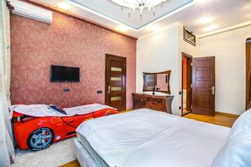 Фото номера Апартаменты с 3 спальнями Апартаменты Luxary Apartment ISR Plaza г. Баку 62