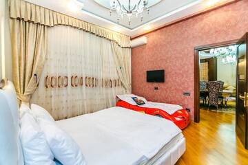 Фото номера Апартаменты с 3 спальнями Апартаменты Luxary Apartment ISR Plaza г. Баку 63